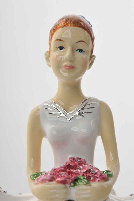 Keren Kopal Ballet Dancer Holding Pink Flowers