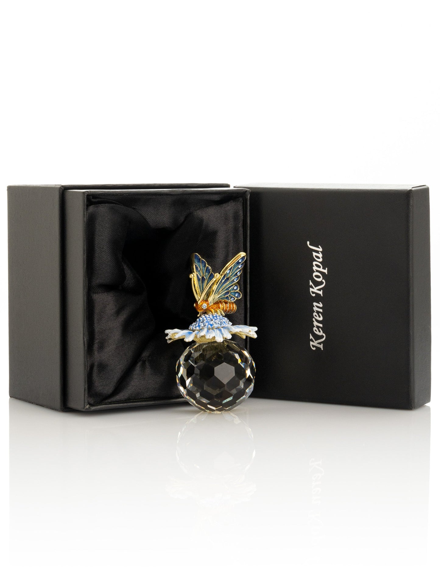 Keren Kopal Butterfly sitting on Flower and Crystal