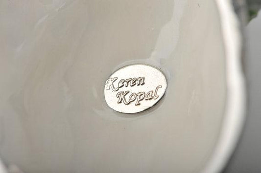 Keren Kopal Red Beetle on Green Cabbage