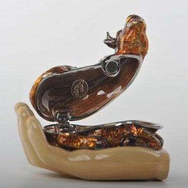 Keren Kopal Zodiac Ox Laying on Hand