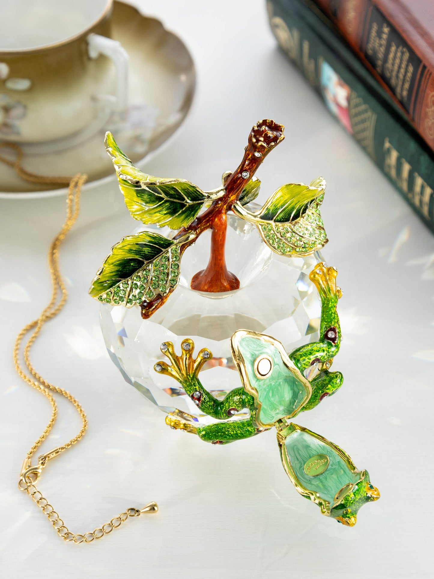 Keren Kopal Crystal Apple with a Green Frog on it