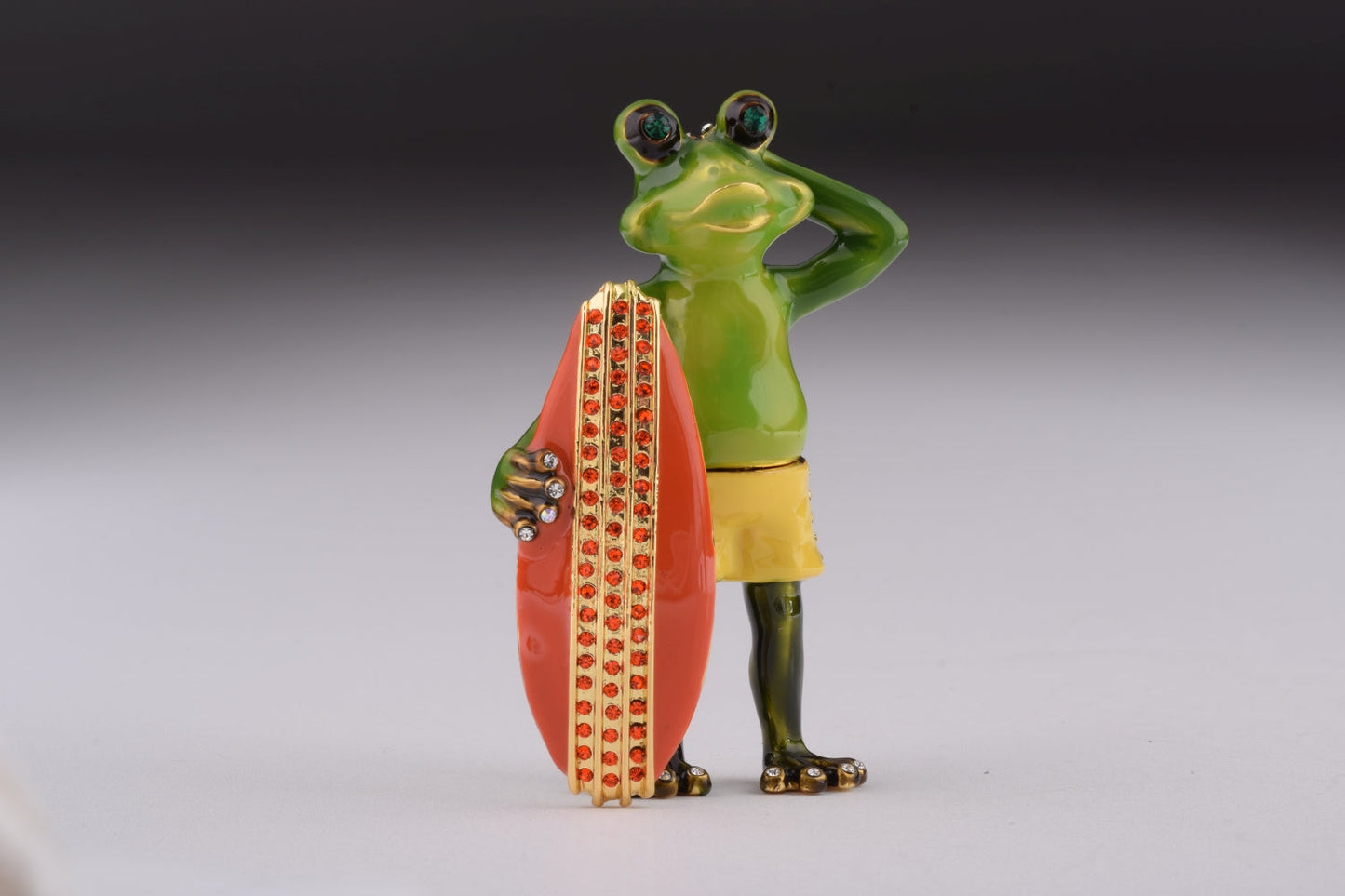 Keren Kopal Frog Holding a Surfboard