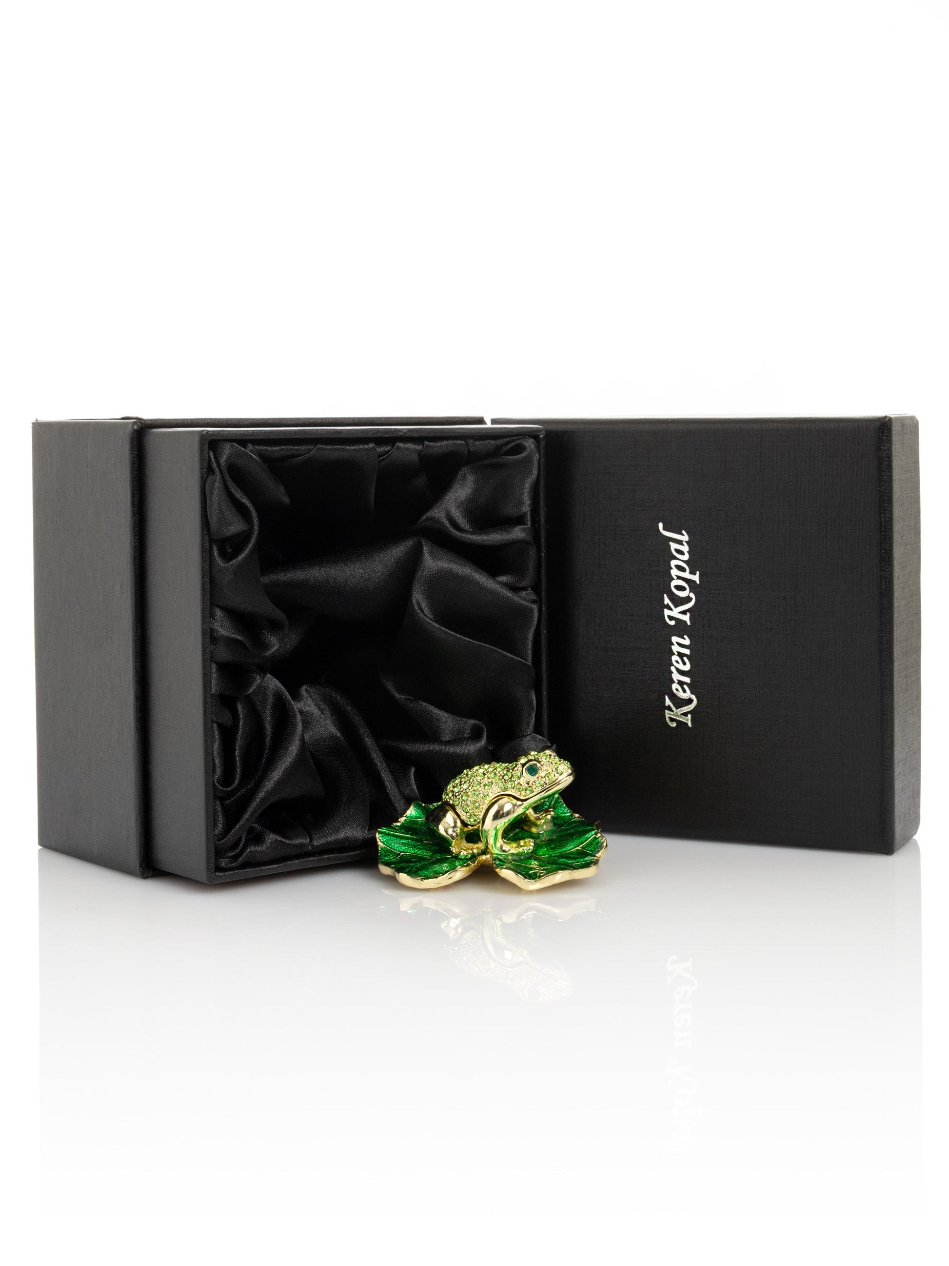 Keren Kopal Golden Frog on Green Leaf