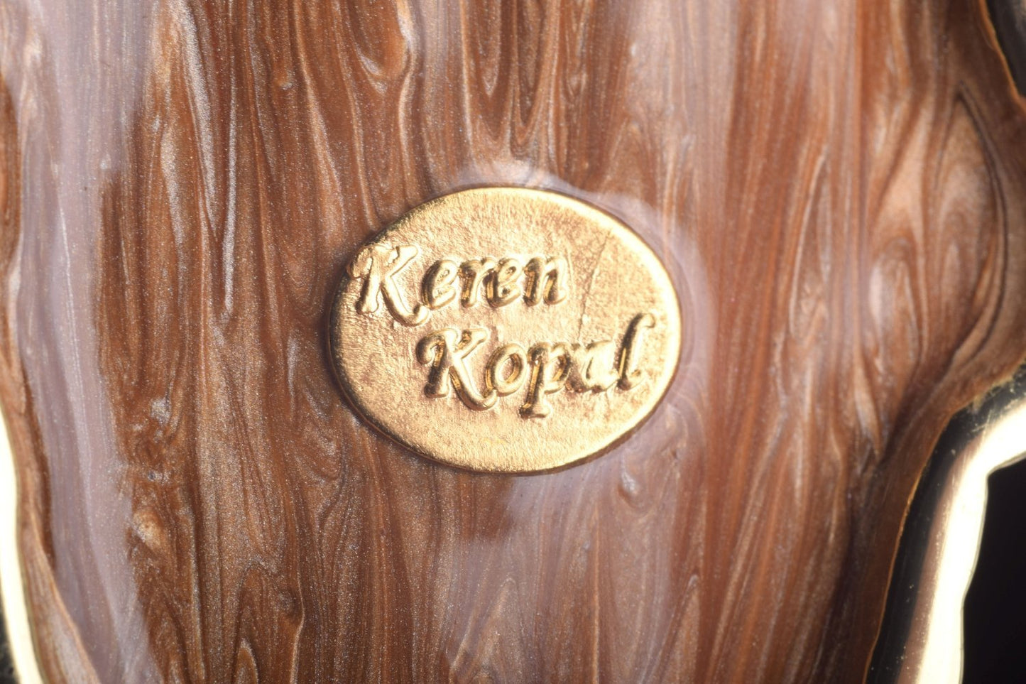 Keren Kopal Gold Feather