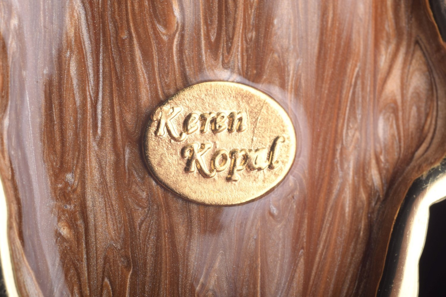 Keren Kopal Gold Feather