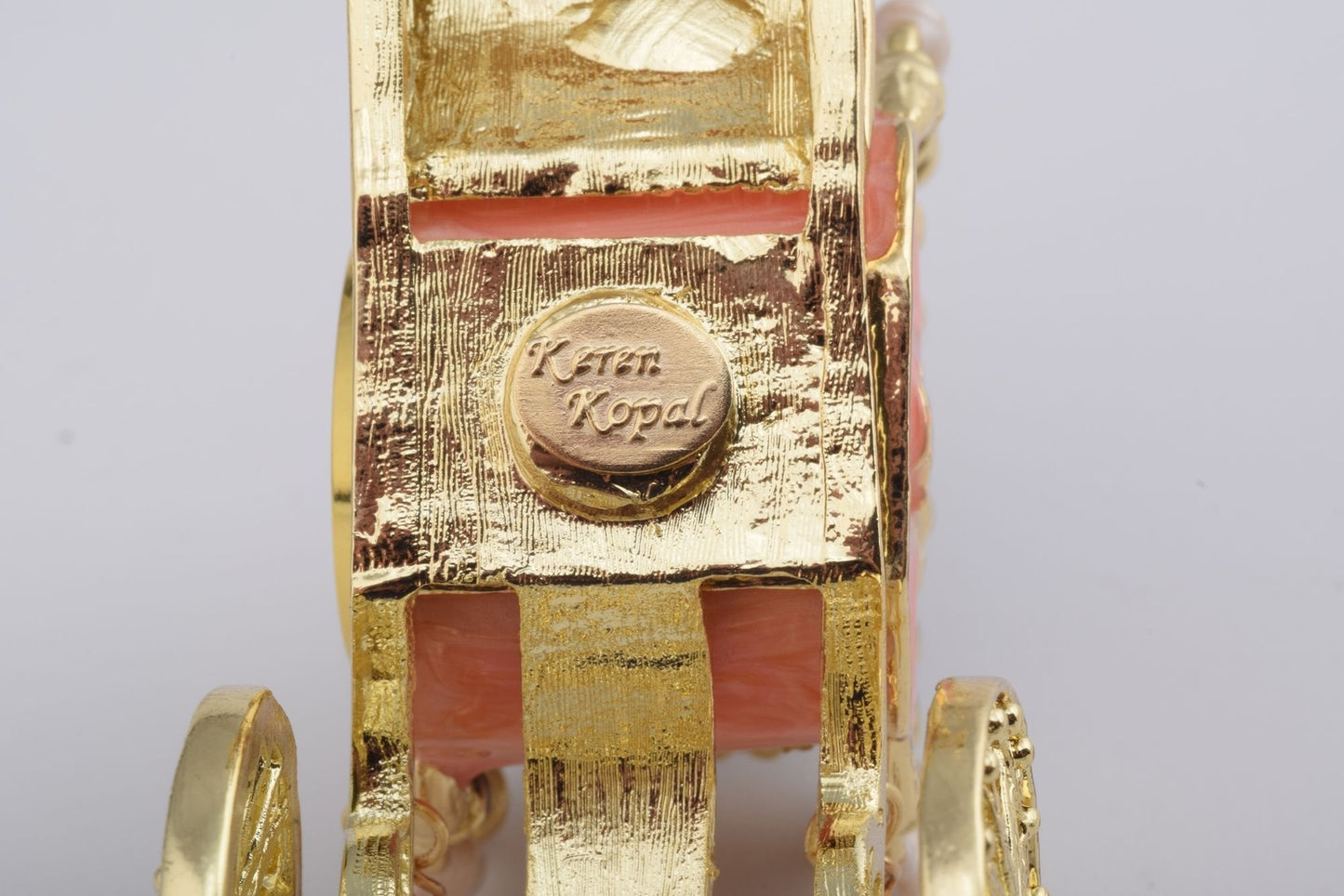 Keren Kopal Golden Carriage with a Clock