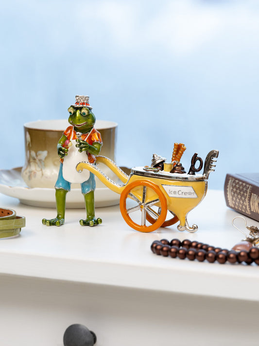 Keren Kopal Frog ice cream seller with a colorful ice cream cart