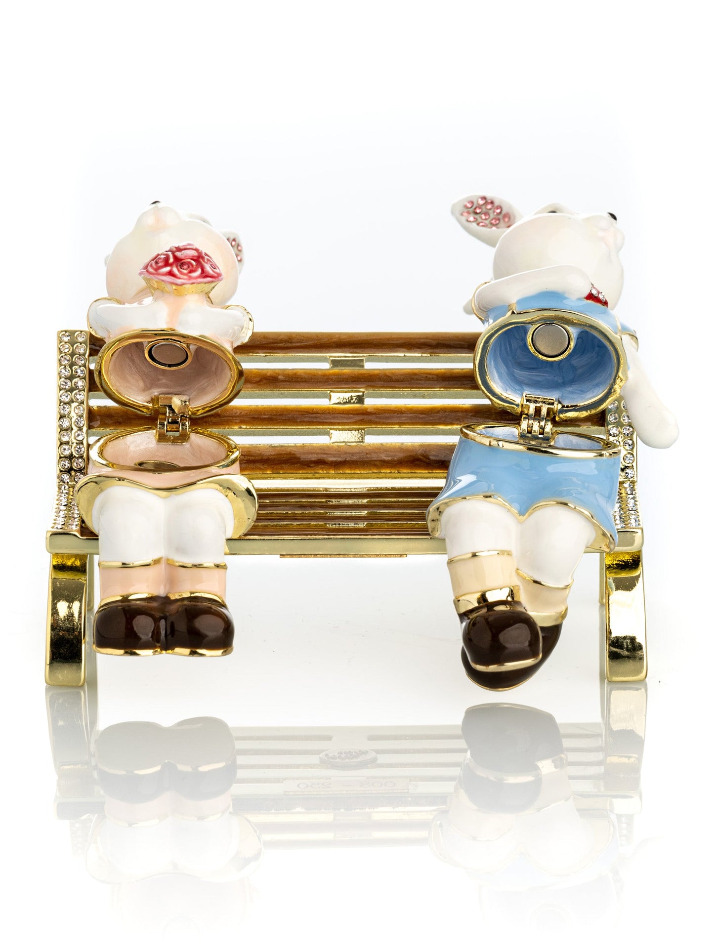 Keren Kopal 2 bunnies in love sitting on a bench, valentine flowers and chocolates