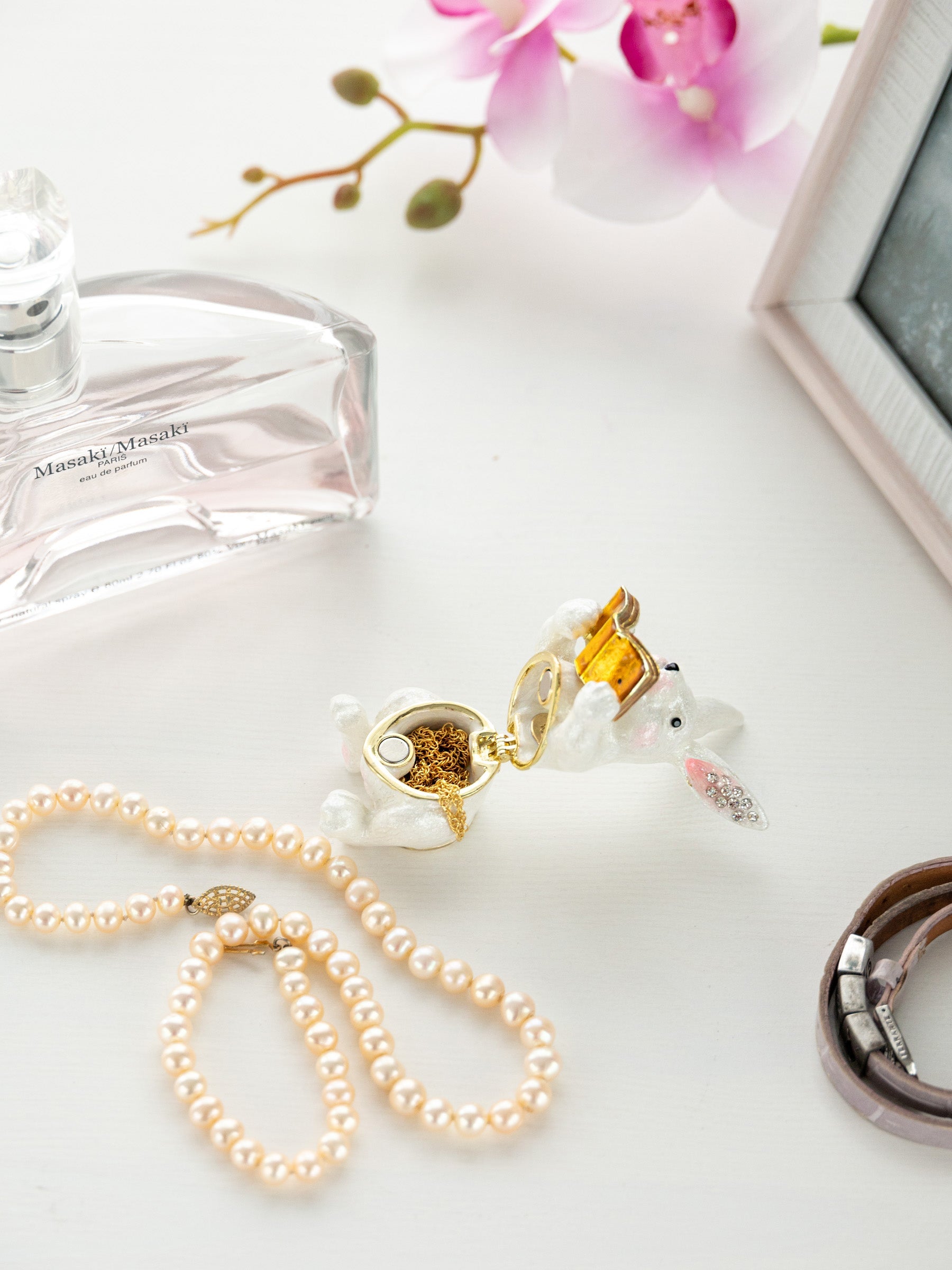 Keren Kopal bunny Sitting and Reading a Book