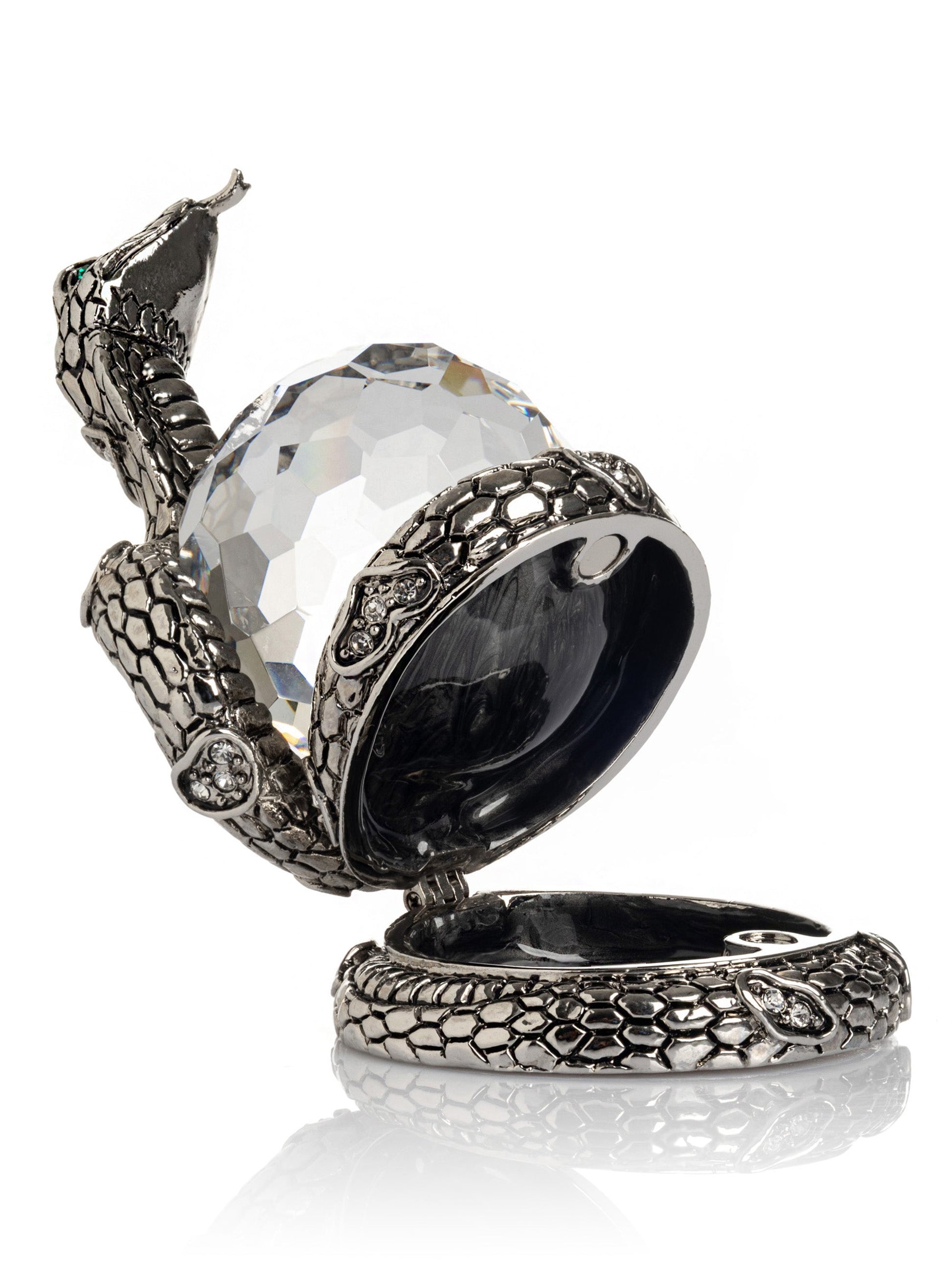 Keren Kopal Snake Holding Crystal