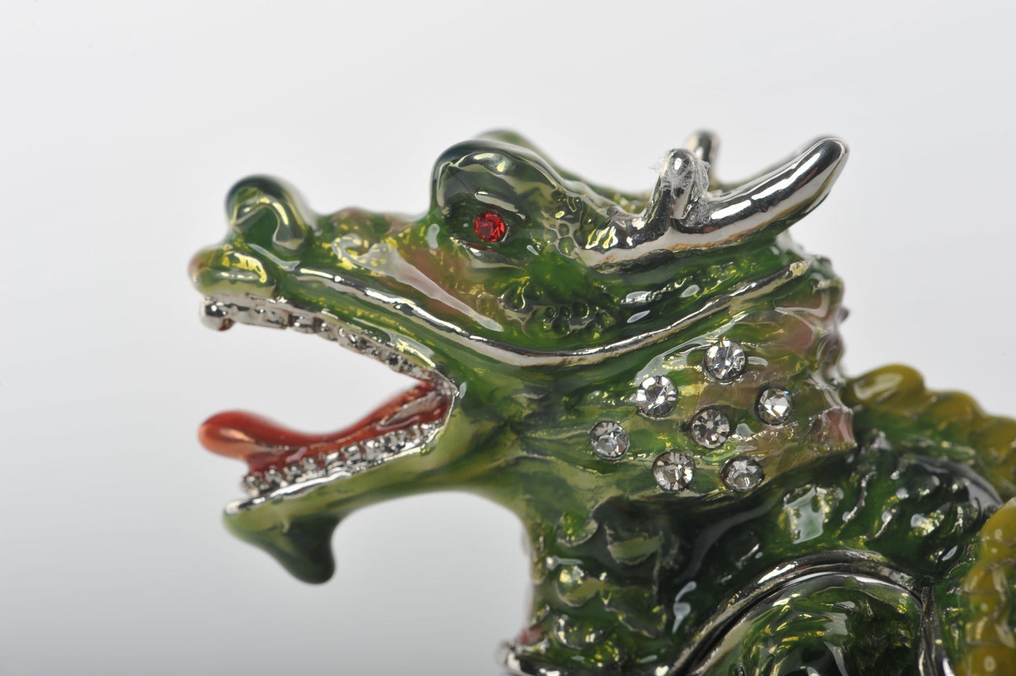 Keren Kopal Zodiac Dragon Laying on Hand