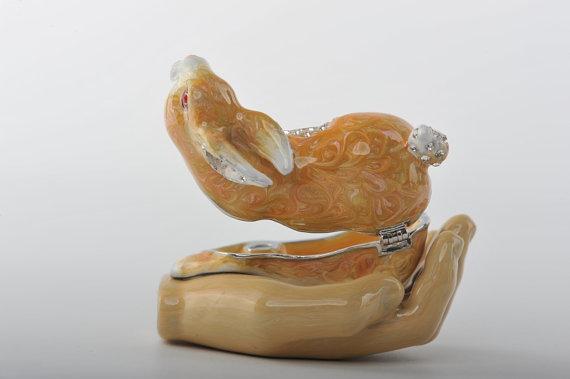 Keren Kopal Zodiac Rabbit Laying on Hand